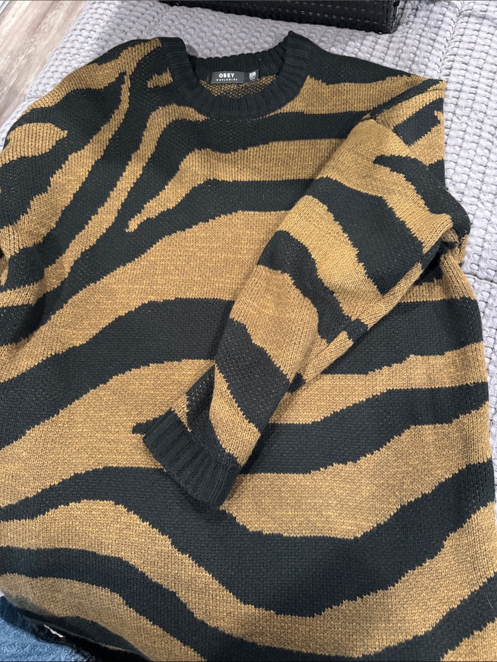 Obey women’s Black and Brown Tiger Stripe Crewneck Sweater